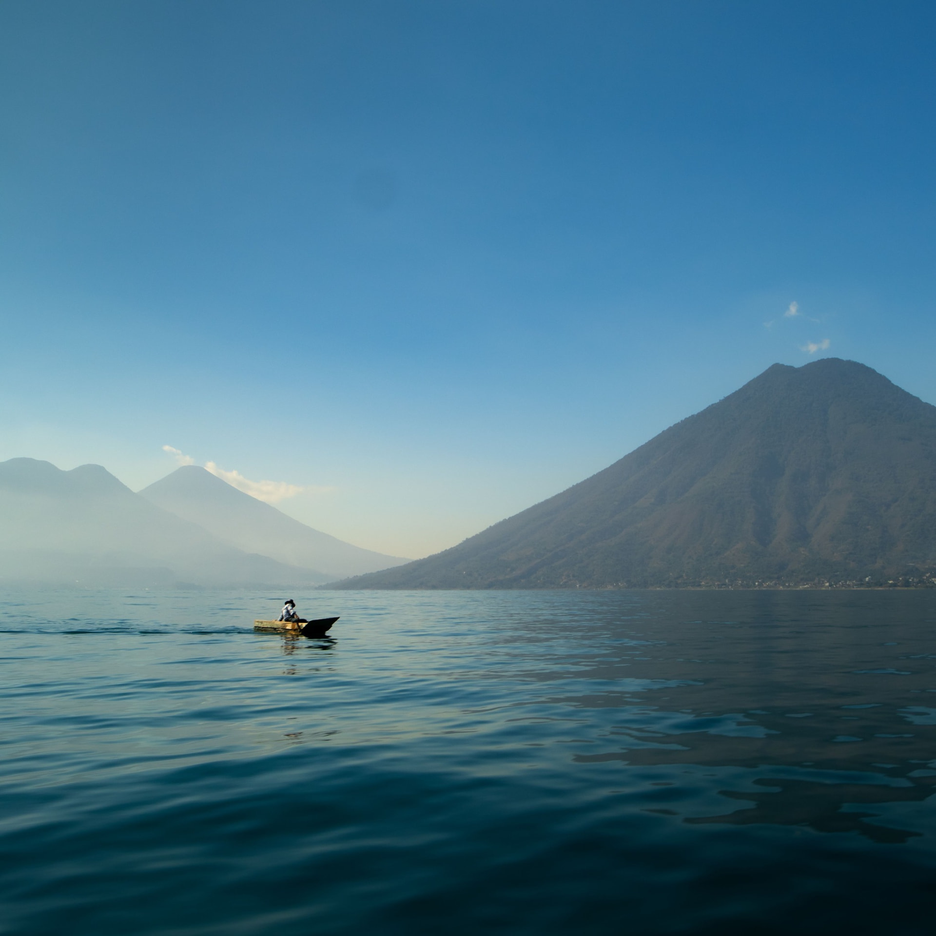 Mountain lake and traditional boat in the Philippines