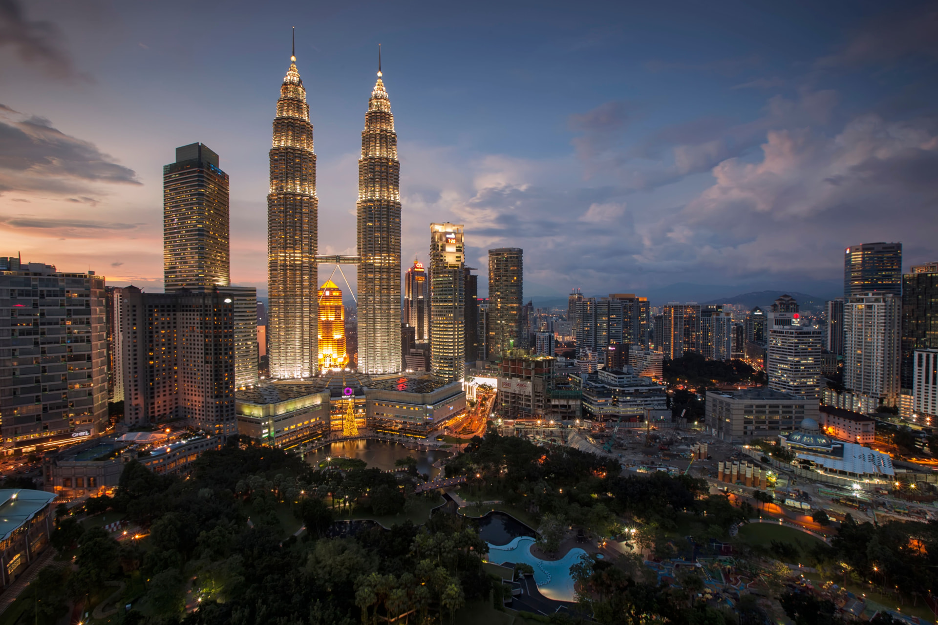 Petronas Towers and Kuala Lumpur skyline at dusk
